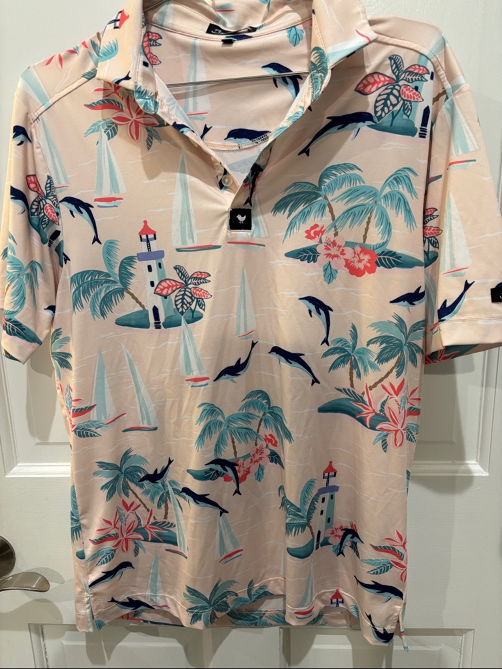 Bad Birdie Pale Pink Tropical Print Polo with Teal & Navy Accents